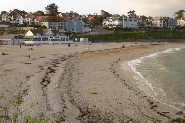 Gyllyngvase beach in Falmouth with the café above the sand