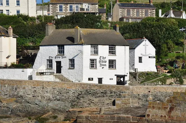 The white-painted Ship Inn above Porthleven harbour