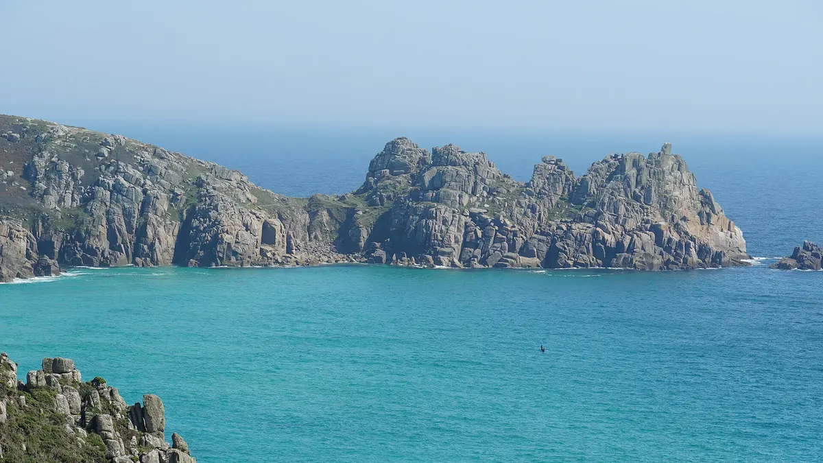 Turquoise water and granite cliffs at Porthcurno
